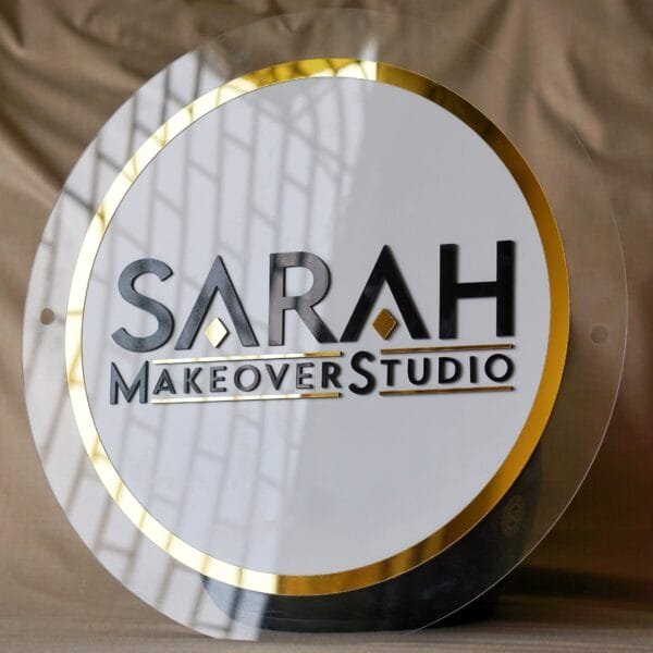 business signboard in white and golden color with 3d embossed letters and transparent border