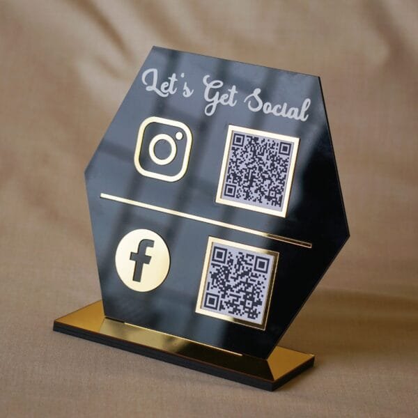 quick response scan stand in black and gold lets get social written on the scan stand