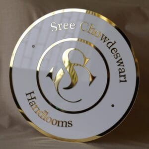 acrylic business logo signage in gold and white