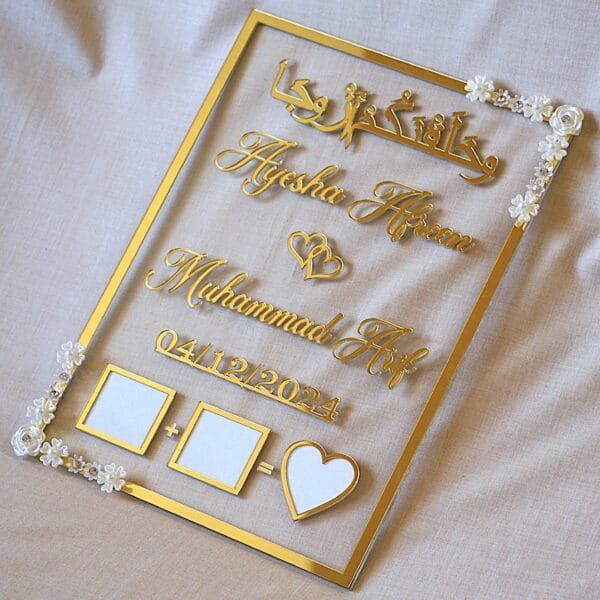 nikah thumb board in transparent and golden color. square design with embellishments on diagonal corners.