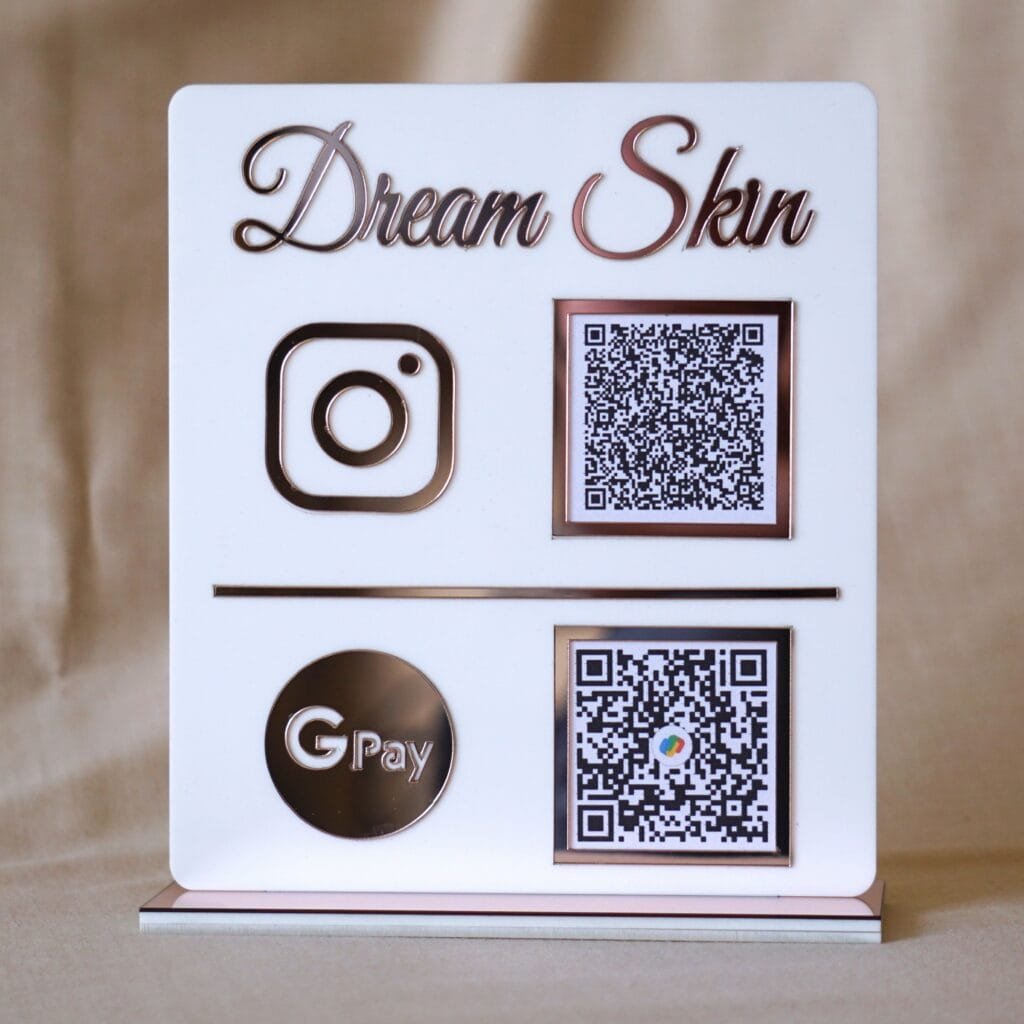 qr code scan stand in white and pink with payment and social media option