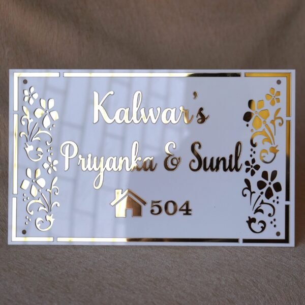 Rectangular white and gold nameplate with floral design, customizable name option.