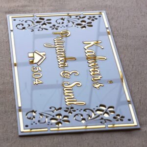 Rectangular white and gold nameplate with floral design, customizable name option.