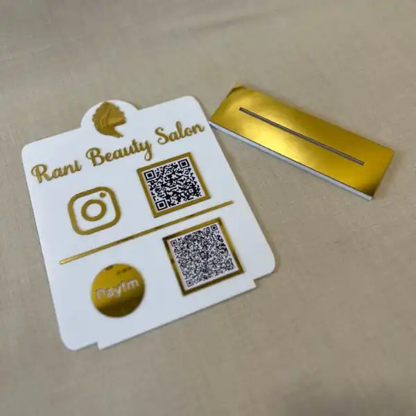 business scanner stand in white and gold with logo and 2 qr codes