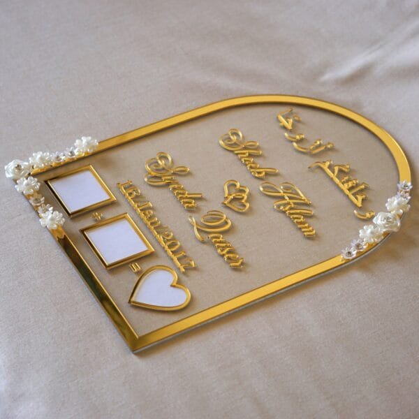 nikah thumb board in golden color with floral embellishments