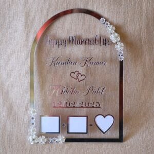wedding thumb print frame in dome shape with floral embellishments and made with transparent and silver acrylic