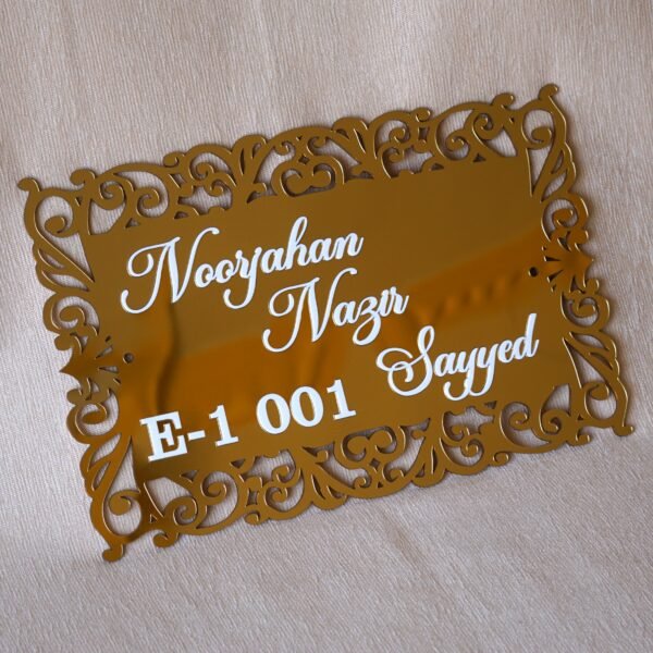 1741871521231 The acrylic nameplate for the home in a Victorian-style border is made using acrylic and MDF for durability, and a golden acrylic sheet is used for royal looks. This nameplate will be a perfect statement piece for the home entrance.