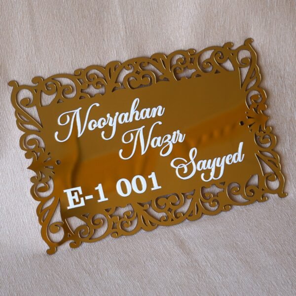 The acrylic nameplate for the home in a Victorian-style border is made using acrylic and MDF for durability, and a golden acrylic sheet is used for royal looks. This nameplate will be a perfect statement piece for the home entrance.