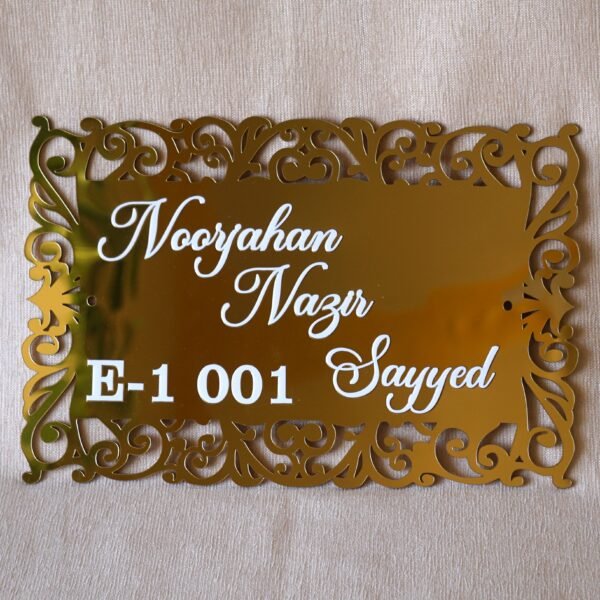 1741871521249 The acrylic nameplate for the home in a Victorian-style border is made using acrylic and MDF for durability, and a golden acrylic sheet is used for royal looks. This nameplate will be a perfect statement piece for the home entrance.