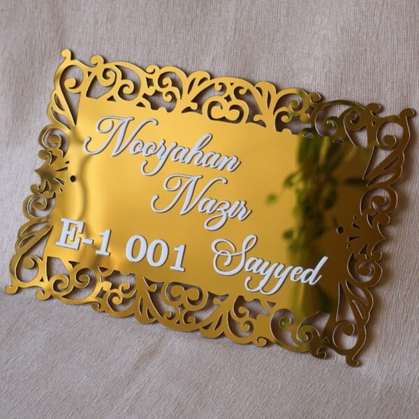 1741871521307 The acrylic nameplate for the home in a Victorian-style border is made using acrylic and MDF for durability, and a golden acrylic sheet is used for royal looks. This nameplate will be a perfect statement piece for the home entrance.