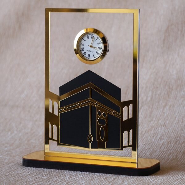 1742134359293 Islamic desk clock in Kaaba design, this product is made using acrylic, and this is used as a clock for an office desk, or it can be displayed on a shelf. It can be a perfect gift for Muslims.
