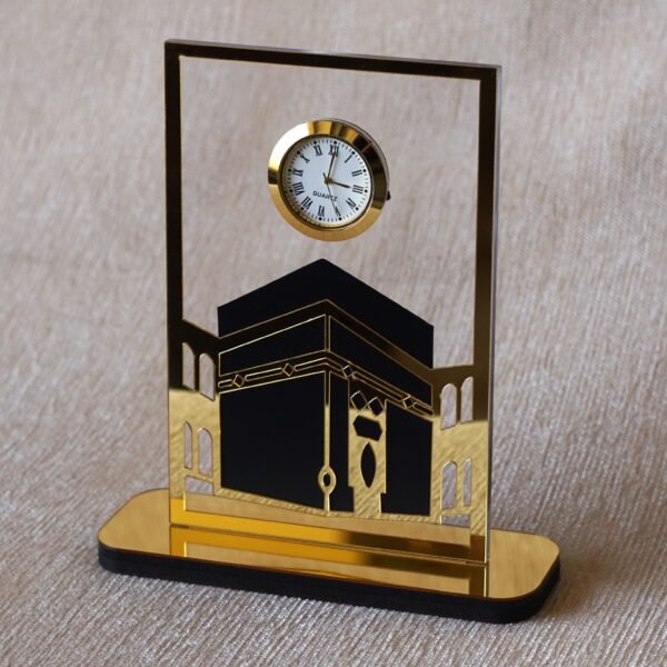 1742134359406 Islamic desk clock in Kaaba design, this product is made using acrylic, and this is used as a clock for an office desk, or it can be displayed on a shelf. It can be a perfect gift for Muslims.