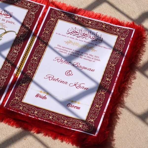 A red fur–clad nikah nama booklet with an acrylic cover and MDF backing, opened to blank pages for the bride’s and groom’s thumbprints and signatures as a lasting wedding keepsake