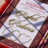 A red fur–clad nikah nama booklet with an acrylic cover and MDF backing, opened to blank pages for the bride’s and groom’s thumbprints and signatures as a lasting wedding keepsake