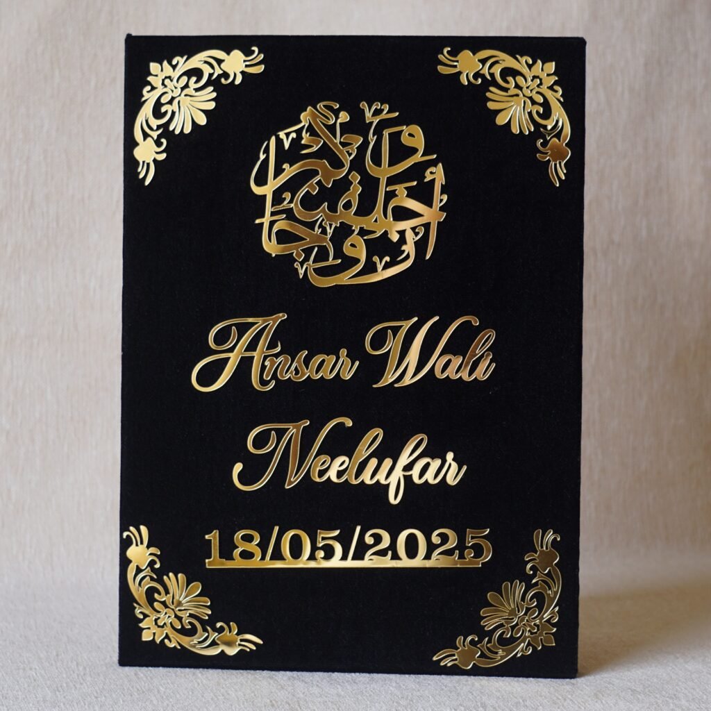 A red fur–clad nikah nama booklet with an acrylic cover and MDF backing, opened to blank pages for the bride’s and groom’s thumbprints and signatures as a lasting wedding keepsake