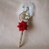 "Customizable Nikah pen adorned with feathers, decorative lace, a rose, and a personalized acrylic name cutout—ideal for signing the Nikah Nama.