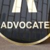 Round 3D embossed advocate signboard, which features a logo. The color combination of this signboard is black and gold, which gives a professional look to the lawyer's office.