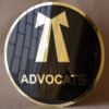 Round 3D embossed advocate signboard, which features a logo. The color combination of this signboard is black and gold, which gives a professional look to the lawyer's office.