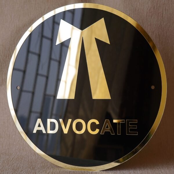 Round 3D embossed advocate signboard, which features a logo. The color combination of this signboard is black and gold, which gives a professional look to the lawyer's office.