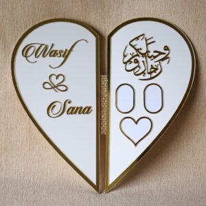 Clear top-down photo of the open heart-shaped Nikah thumb board, displaying the full personalised design against a beige background.