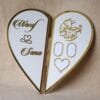 Main product photo of the personalised foldable Nikah board opened into a complete heart shape with gold details.