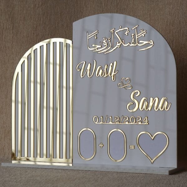 DSC08335 An angled perspective of the custom Nikah wedding board, showing the depth of the 3D gold lettering and the elegant contrast under cool lighting.