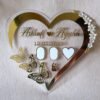 Full front view of a heart-shaped acrylic Nikah thumb board, personalized with the names 'Ashraf & Ayesha' and a date.