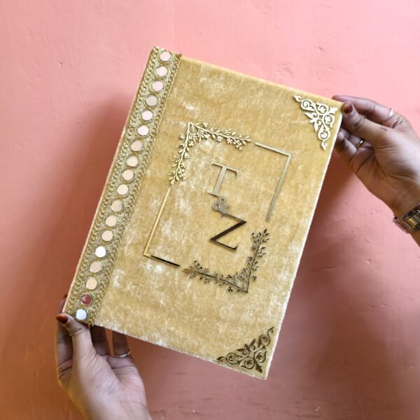 20250721_135700 A person holding the custom golden velvet Nikah Nama booklet to show its premium quality and size.