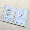 The open Nikah Nama booklet showing the personalised couple's names on the left and the English wedding agreement text on the right.