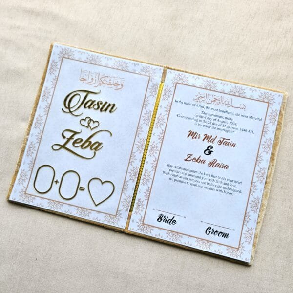 20250721_141231 The open Nikah Nama booklet showing the personalised couple's names on the left and the English wedding agreement text on the right.