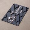 A perspective shot of the custom Muslim home decor nameplate, emphasizing the beautiful 3D effect of the rose gold calligraphy.