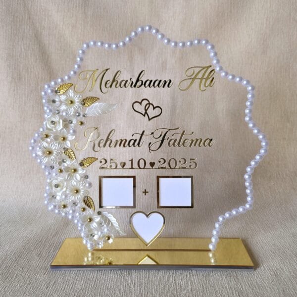 A full view of the assembled personalized Nikah thumb board, showing its unique shape and how it sits securely in the polished gold acrylic stand.