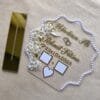 Top-down view of the Nikah thumb board and its separate gold mirror stand, showcasing all the personalized elements and decorative details.