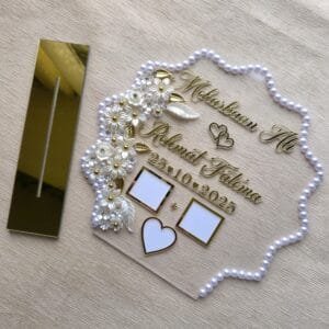 Top-down view of the Nikah thumb board and its separate gold mirror stand, showcasing all the personalized elements and decorative details.