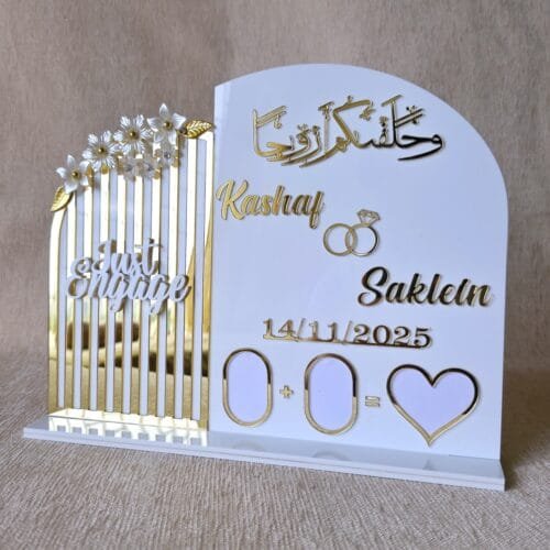 A side-angle view of the personalised Islamic engagement thumb board, showing the 3D effect of the gold lettering.